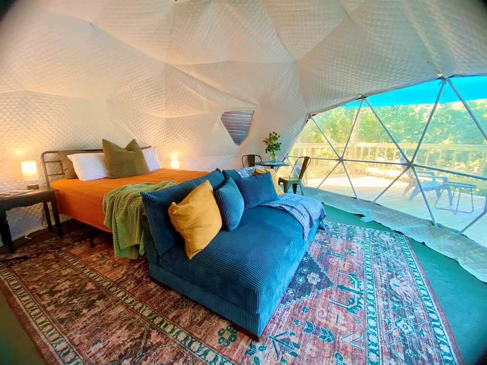 Colorful bedroom inside the Shack Dome